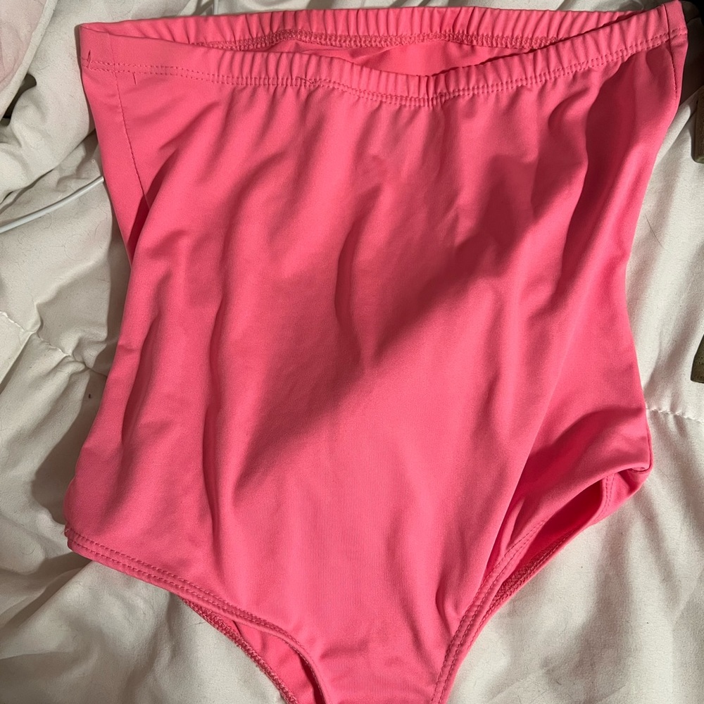 Bright neon pink tube top body suit